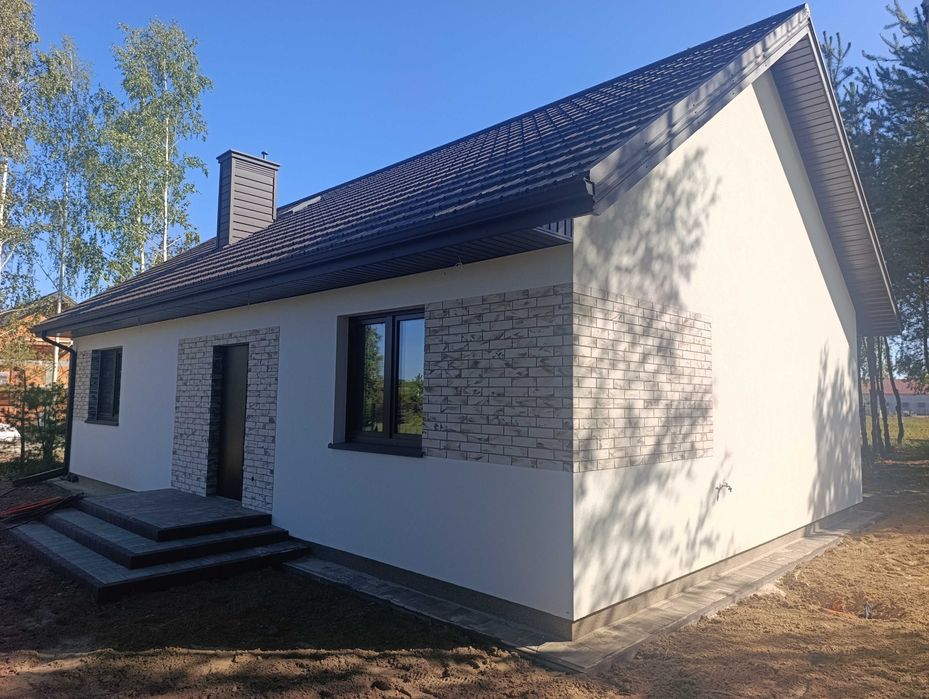 Nowy dom w stanie deweloperskim na dużej zagospodarowanej działce