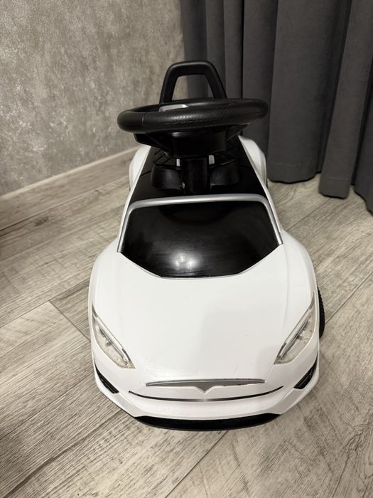 Машина Толокар tesla