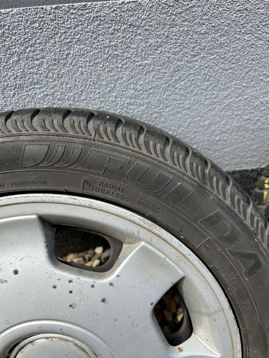 Komplet kół R14 dla VW Polo z oponami całorocznymi Fulda