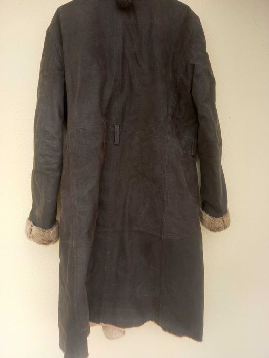 Genuine leather vintage coat with faux fur