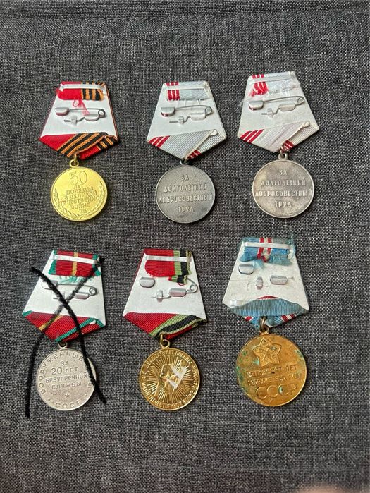 Обміняю меділі на фото принадлежності