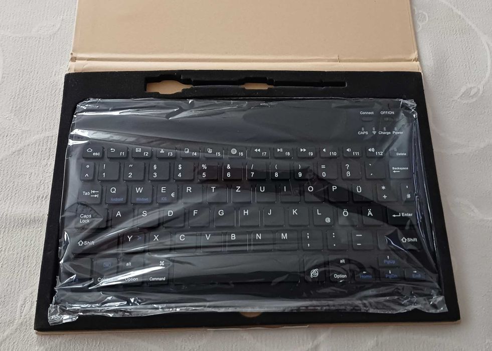 Клавіатура бездротова для  планшета , смартфону.