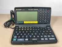 SHARP Wizard OZ-630 elektroniczny organizer komputer lata '90