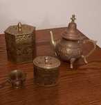 Peças decorativas em latão e bronze