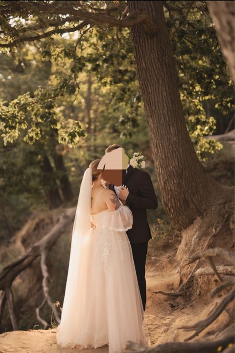 Suknia ślubna z welonem