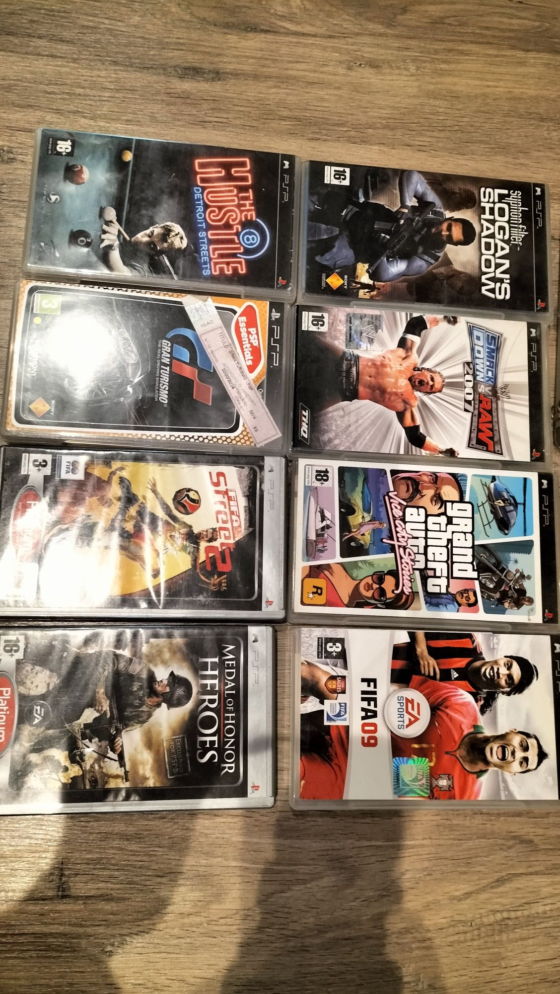 PSP Portable + 8 jogos