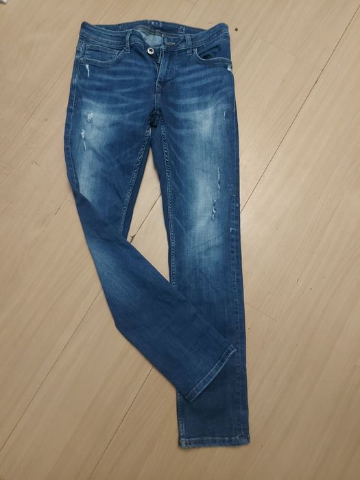 Spodnie jeansy pojemne kieszenie przednie