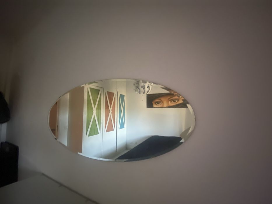 Espelho oval com suportes