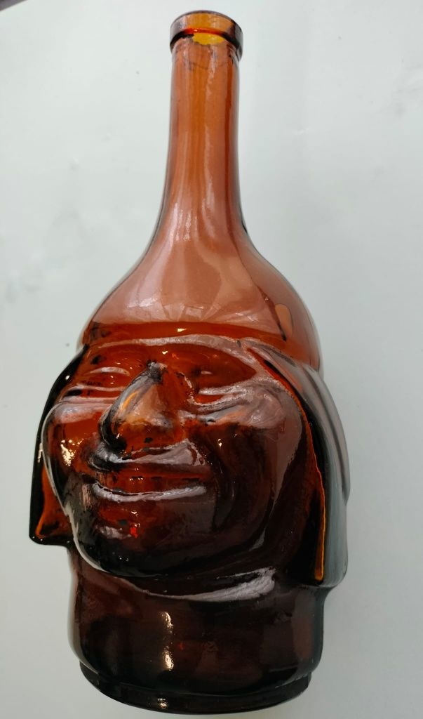 Garrafa, inca, sem conteúdo.
