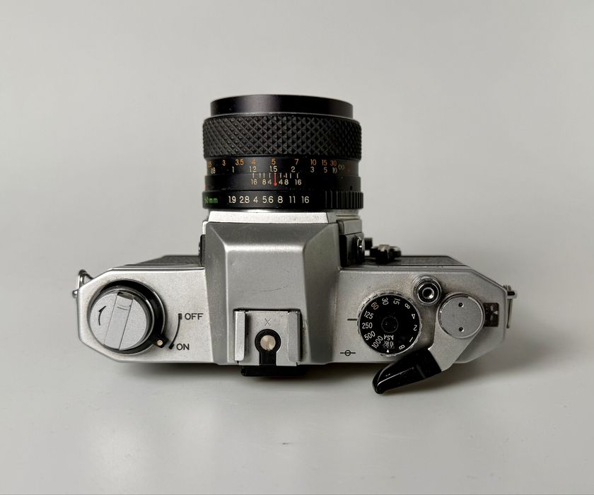 Плівкова Yashica FX-2 з Yashica DSB 50/1.9 та конвертером 2x Yus