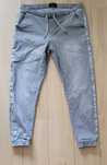 Spodnie typu  jogger Mohito Denim Collection po bokach srebrne  lampas