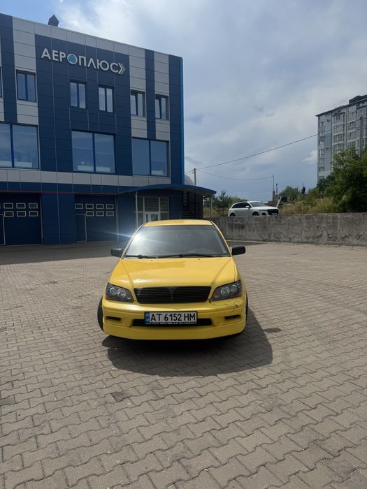 Продам Mitsubishi Lancer 2002