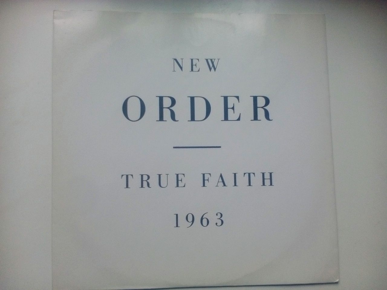 Capa do Vinil New Order e livro do vinil Depeche Mode