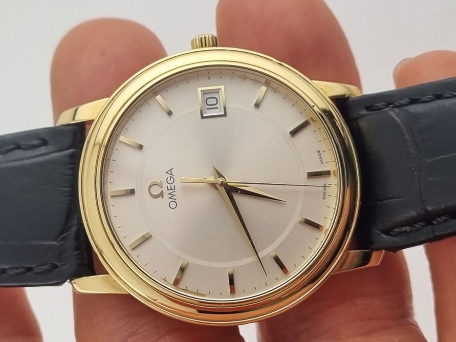 Золотые часы Omega