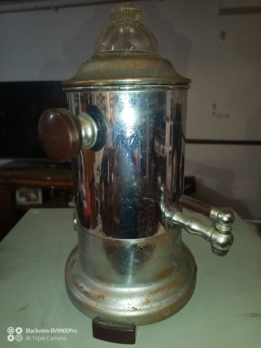 Máquina de café mas bem antiga