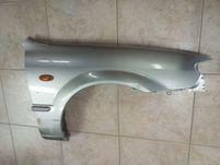 Guarda-lamas frt. drt. Mazda 323F BJ