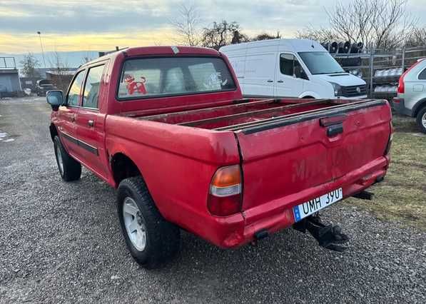 Масляний радіатор Розборка Mitsubishi L200 Л200 Радиатор Разборка Шрот