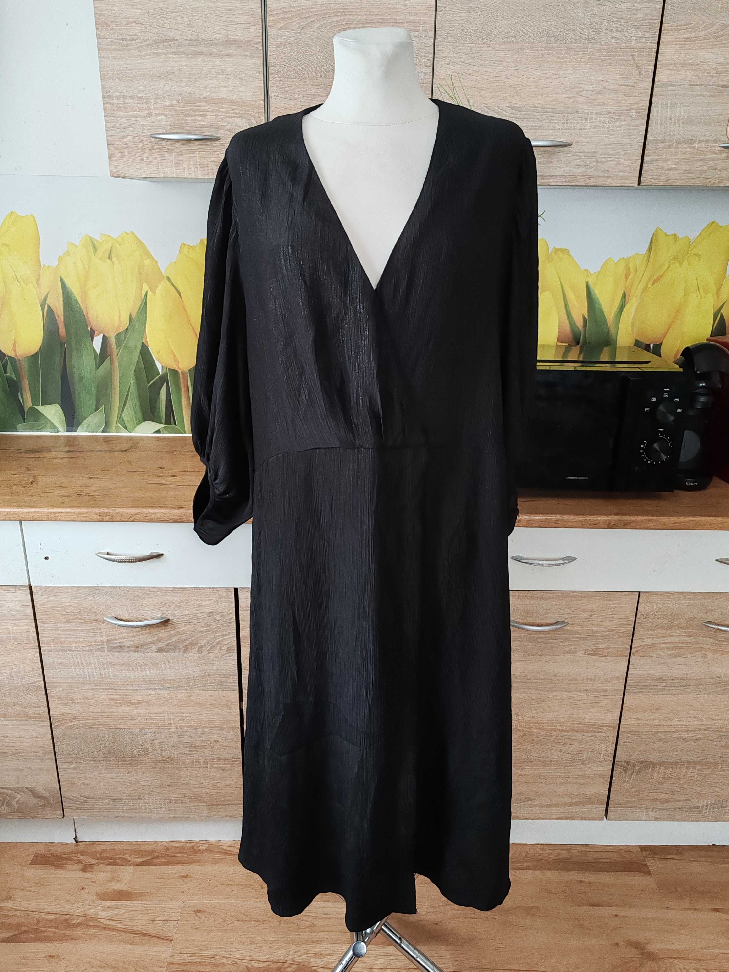 Ciekawa lekka koktajlowa sukienka H&M rozmiar ok 50 poliester