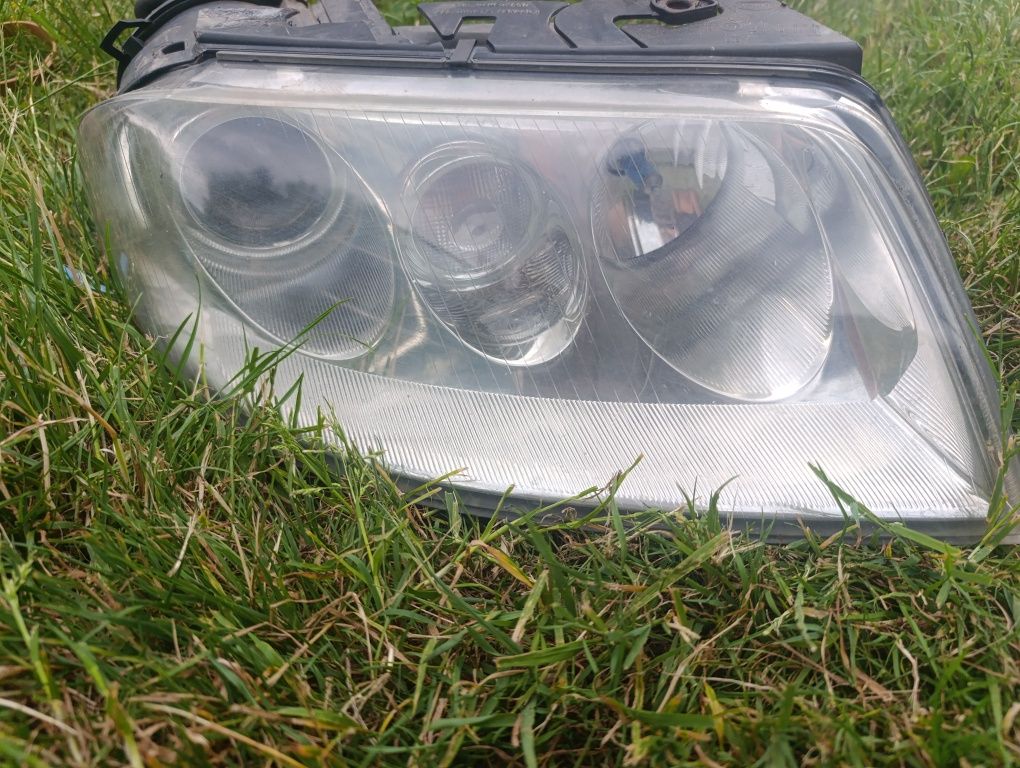 Oryginalne lampy Hella VW Passat B5 FL – komplet lampy przód