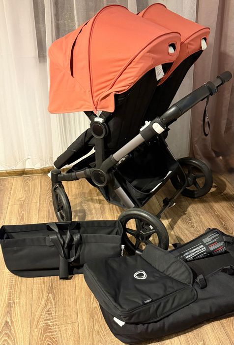 Bugaboo Donkey 5 Sunrise Red Black Duo wózek rok po roku bliźniaczy