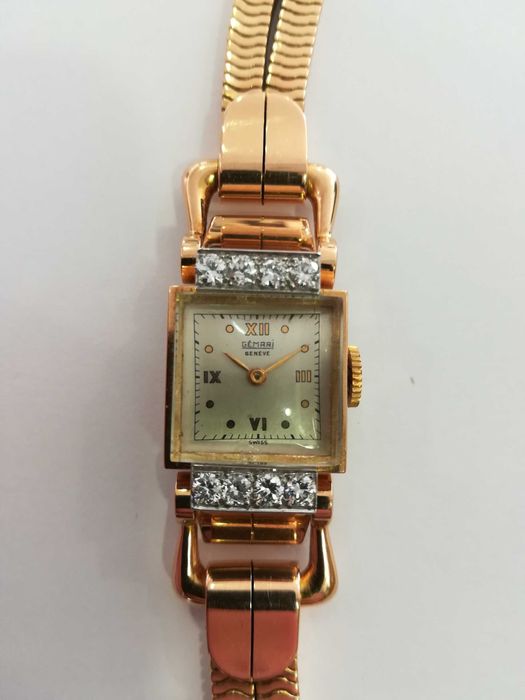 Relógio de corda todo em ouro e diamantes