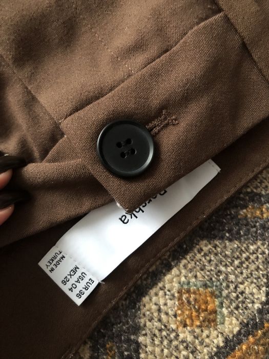 Brazowe spodnie flare bershka 36 do pracy
