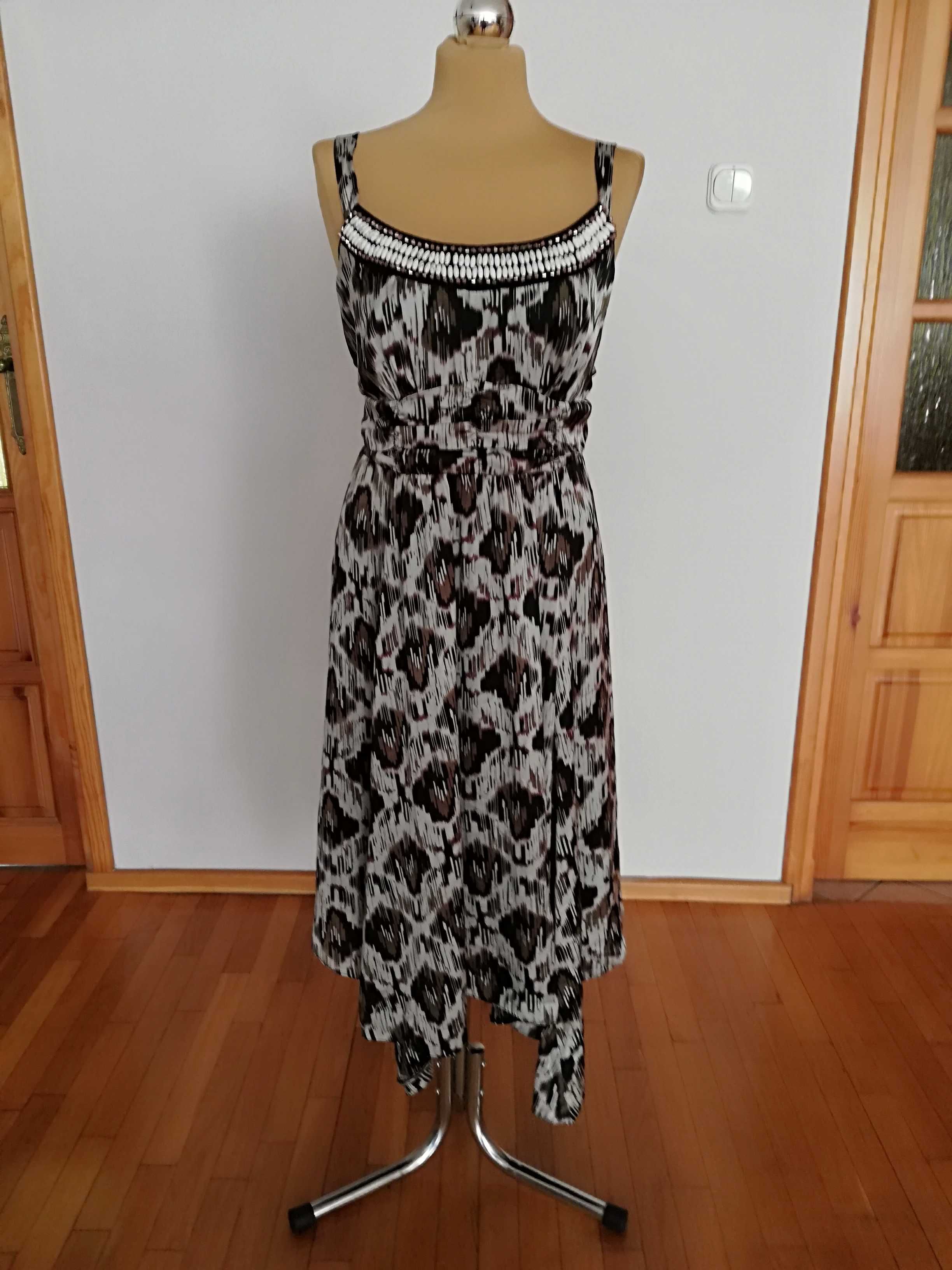Sukienka z ozdobnym dekoldem asymetryczna panterka 48 50