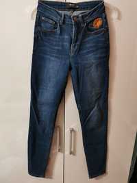 Spodnie jeansy dżinsy damskie Reserved 34 XS ciemne granatowe haft