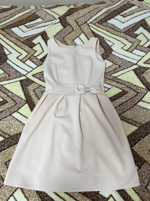 Пудрова сукня з бантиком, підкладкою та замочком