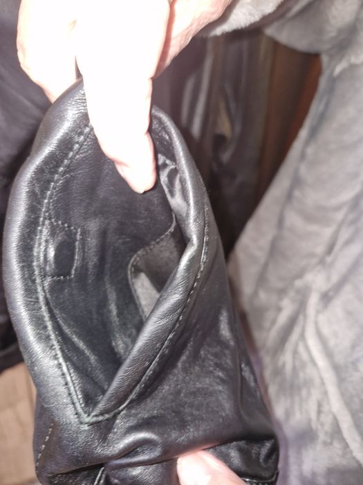 Шкіряна куртка жіноча,розміо 52-54 .