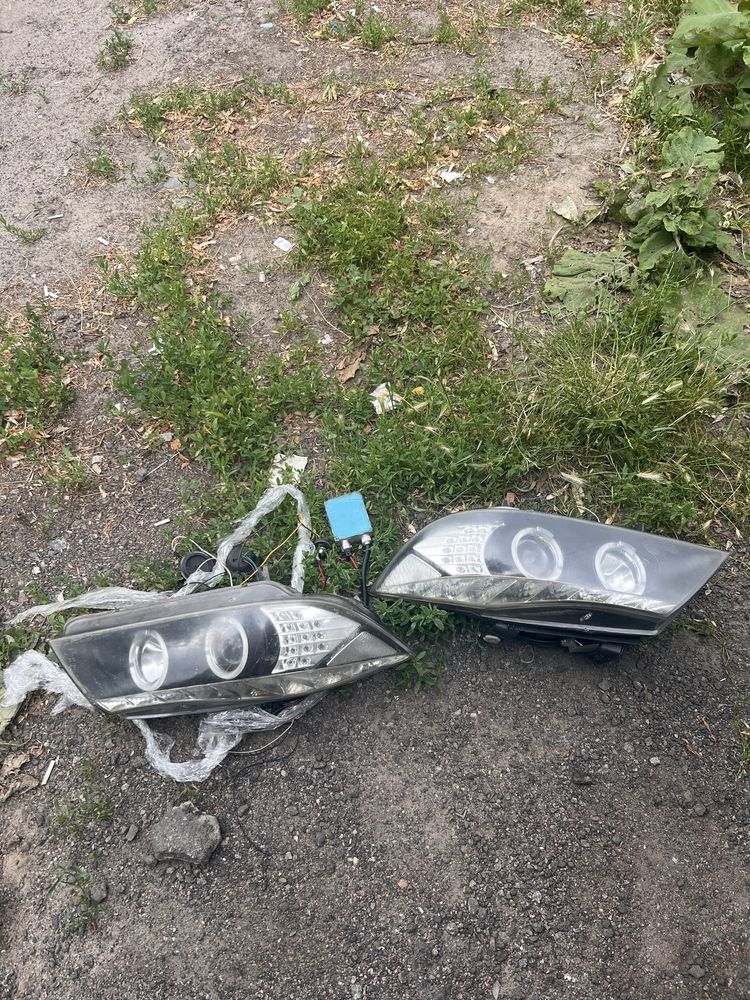 Продам фари на бмв Е90 BMW та нове скло на фари