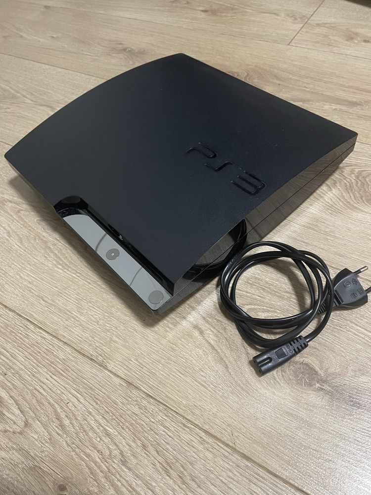 Konsola PS3 + 2 pady + kamerka + zestaw gier