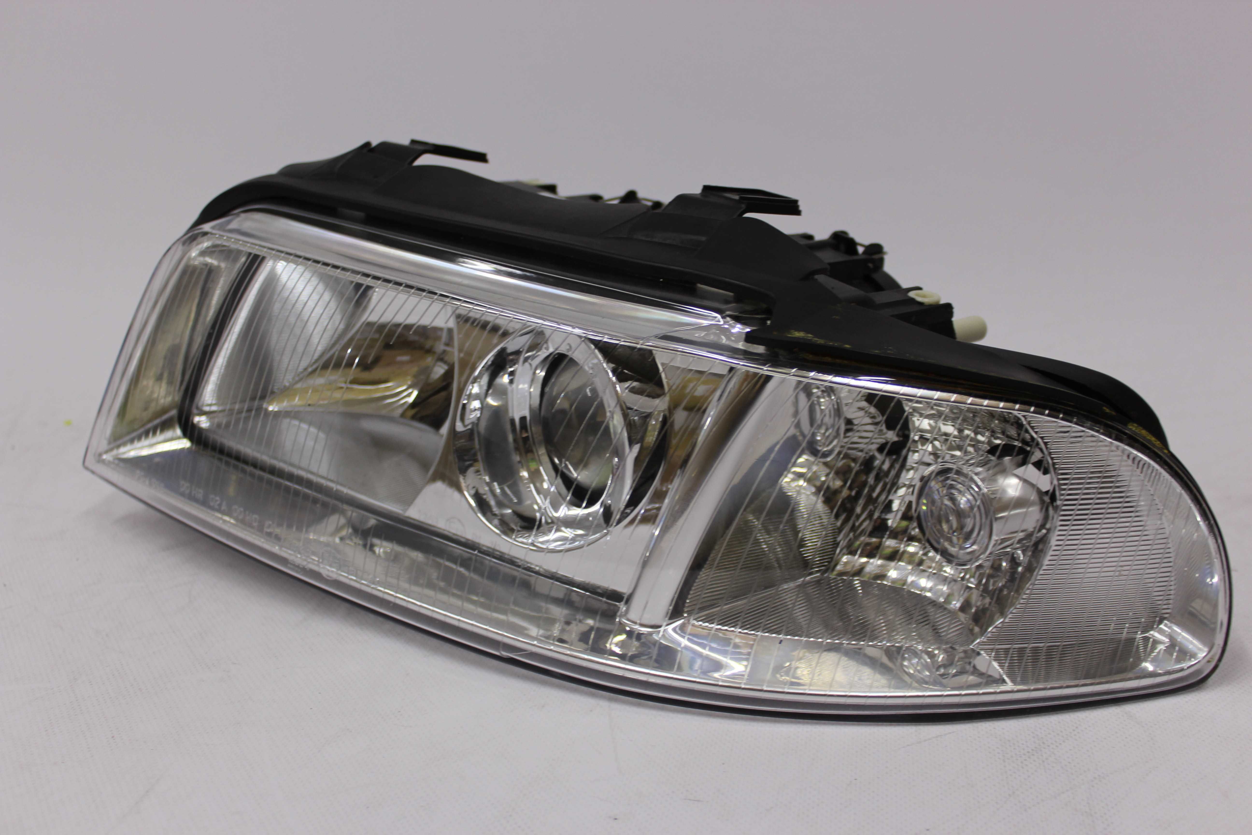 Lampa lewa reflektor przedni przód AUDI A4 B5 99-00 Soczewka NOWA