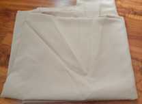 Materiał beżowy na zasłony 300/150 cm.
