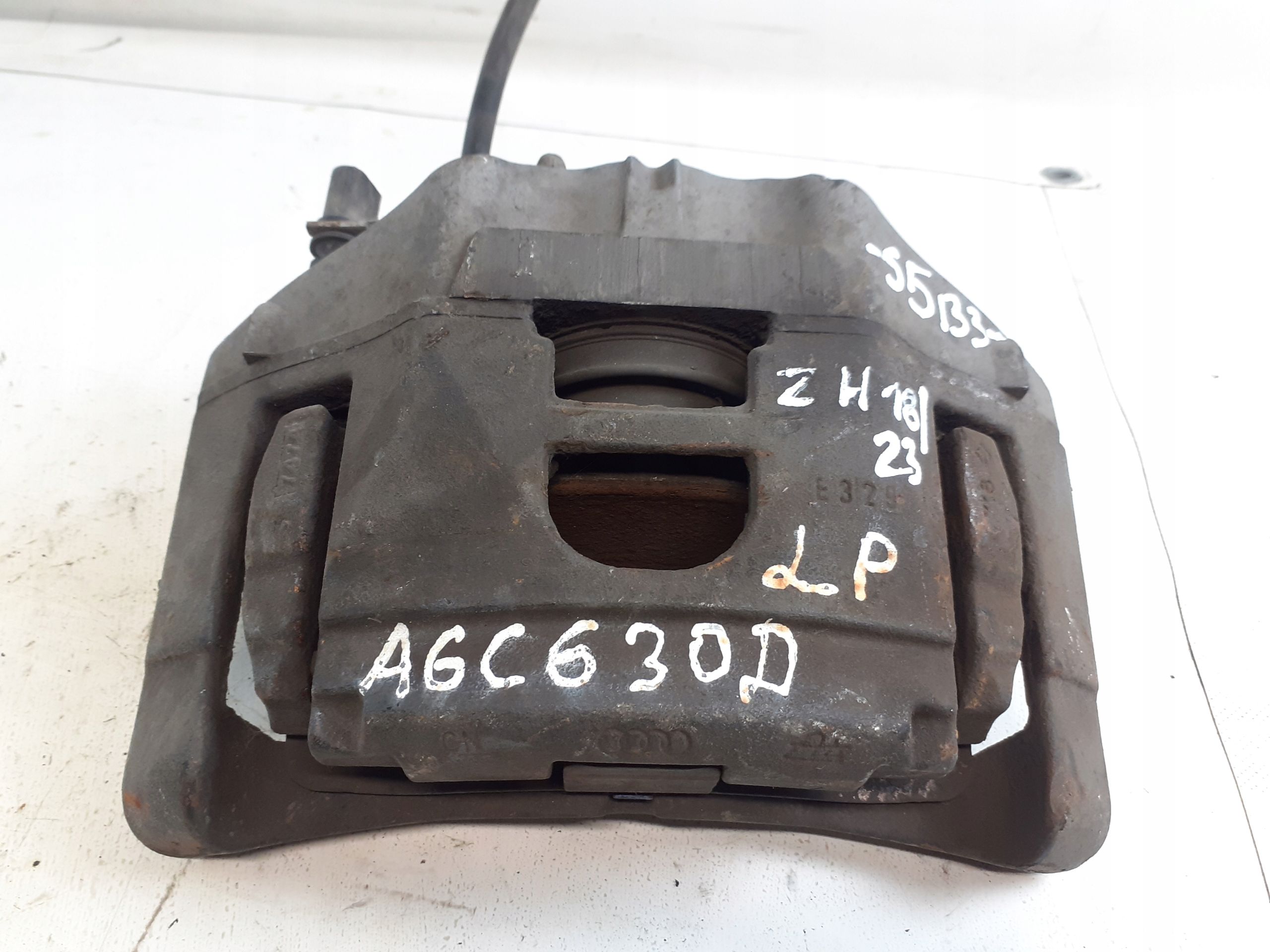 Zacisk Lewy Przod Przedni Audi A6 C6 3.0 TDI