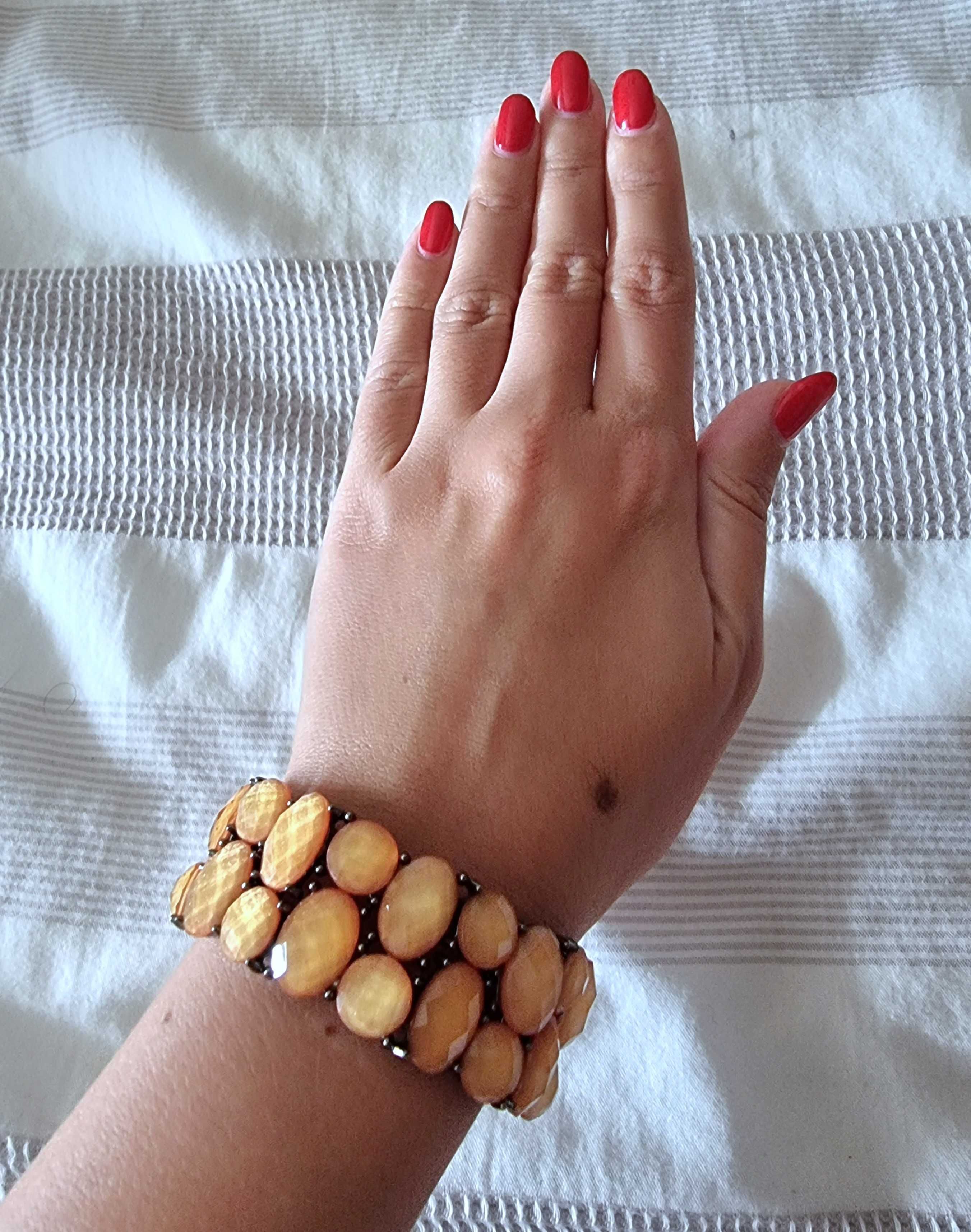 Pulseira com pedras em tons damasco/coral