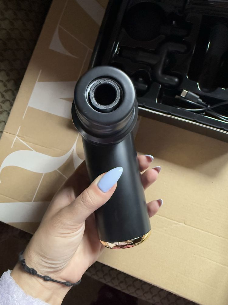 Pistola de massagem nova