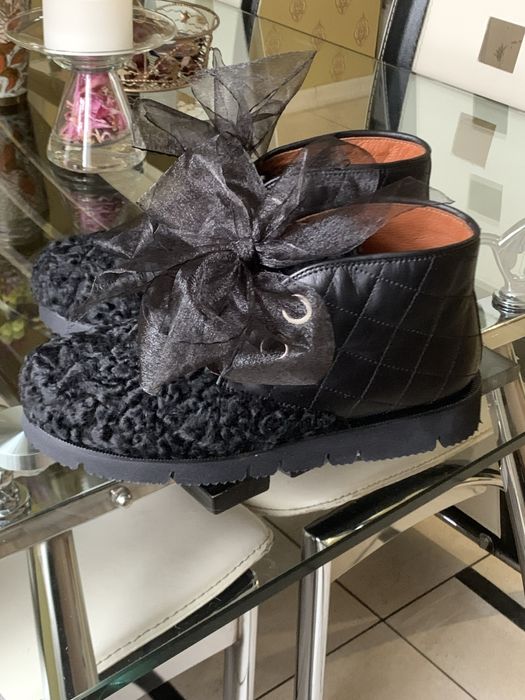 Ботинки из каракуля