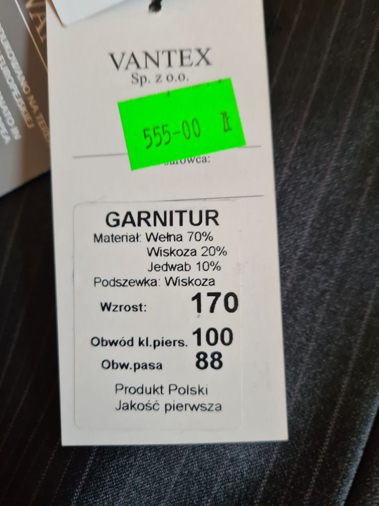 Nowy garnitur w komplecie że spodniami 170