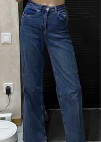 широкі довгі джинси