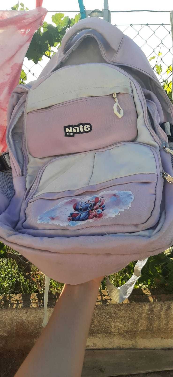 Mochila stich em bom estado e resistente