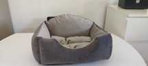 Cama de cão cinzenta para cães pequenos