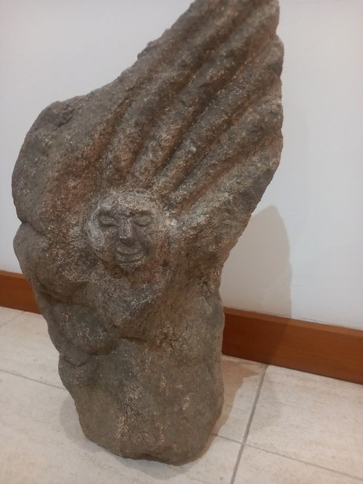 Carinha em pedra