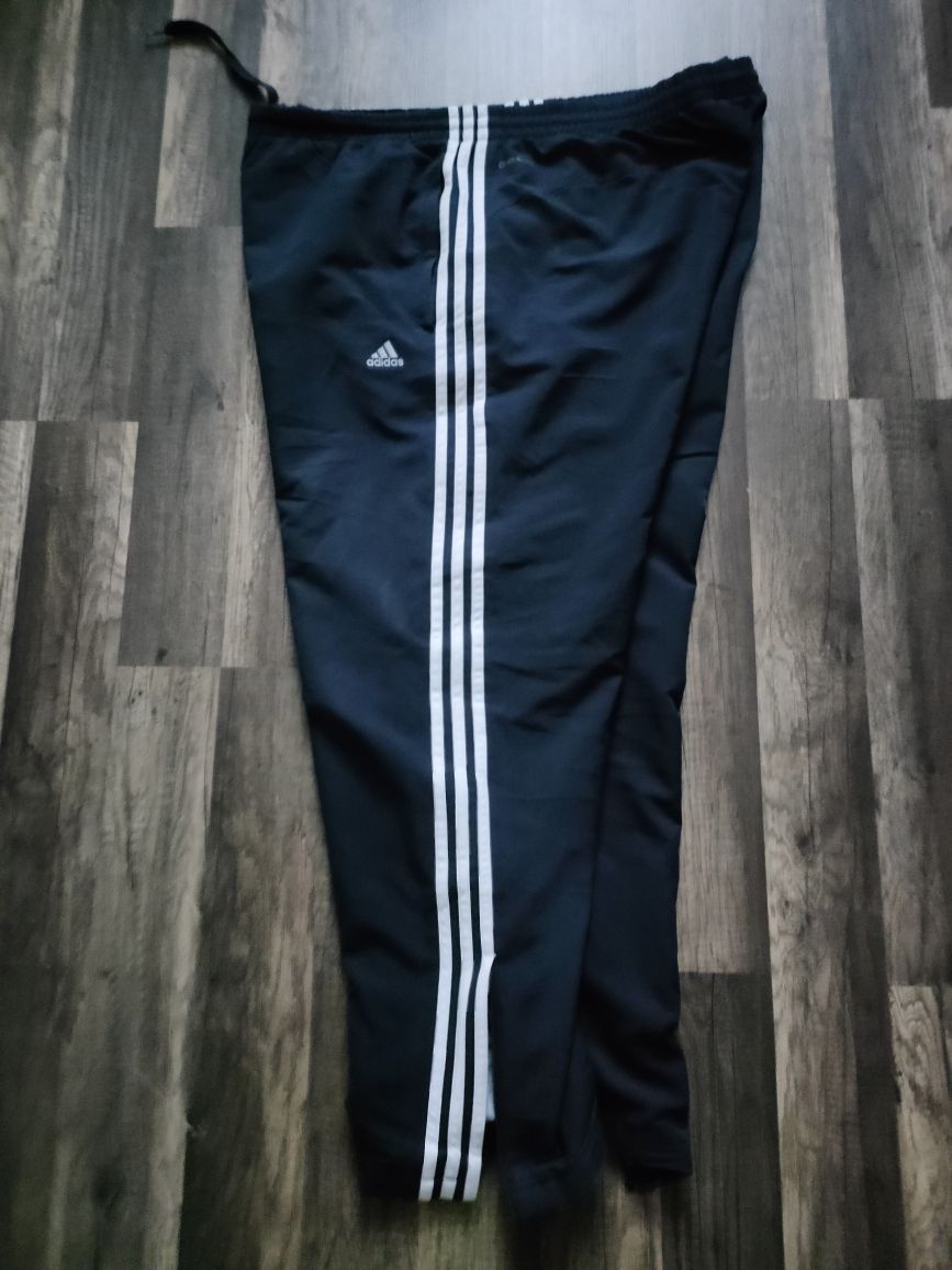 dresowe spodnie Adidas Climalite z podszewką i zamkami