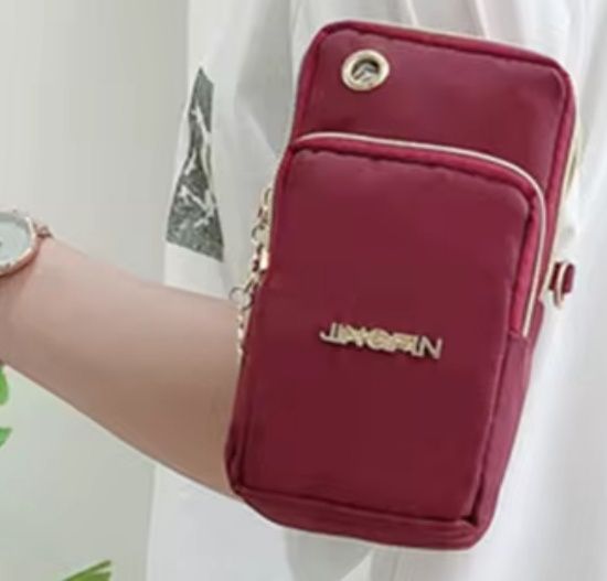 Bolsa crossbody BORDEAUX de ombro para telemóvel e fones de ouvido.