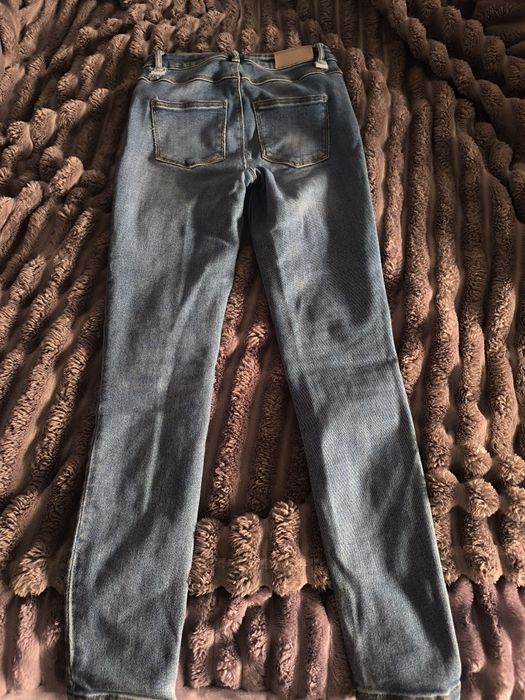 Скині джинси синього кольору