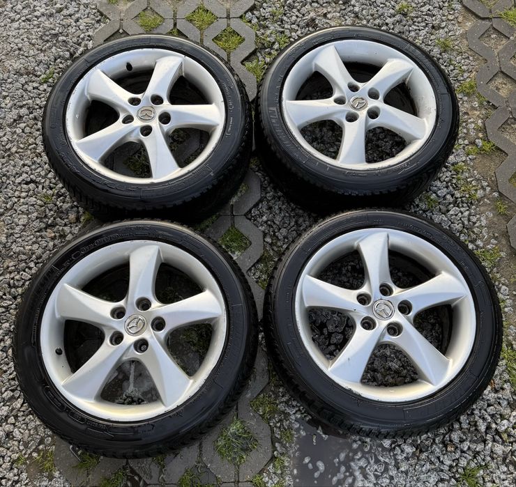 Felgi 5x114.3 215/50/17 opony zimowe 6mm bieżnika Mazda Toyota Renault
