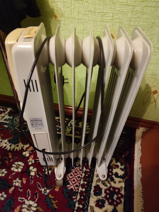 Масляный обогреватель.