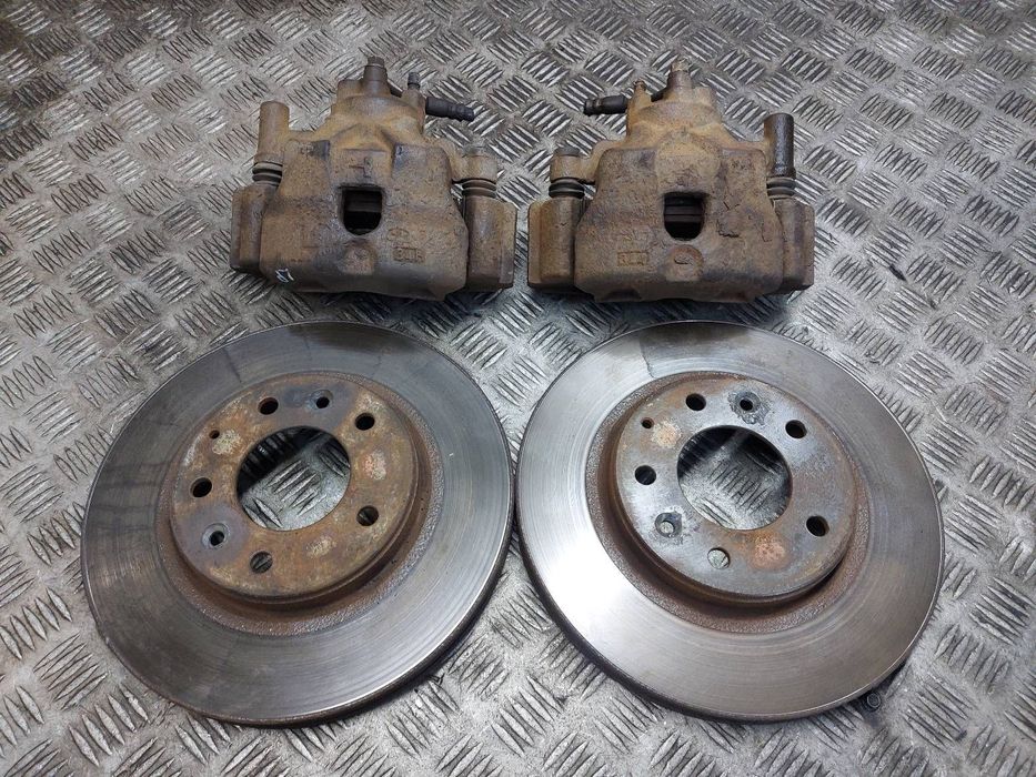 TARCZE HAMULCOWE PRZÓD + KLOCKI + ZACISKI MAZDA 6 I GG GY 1.8 16V
