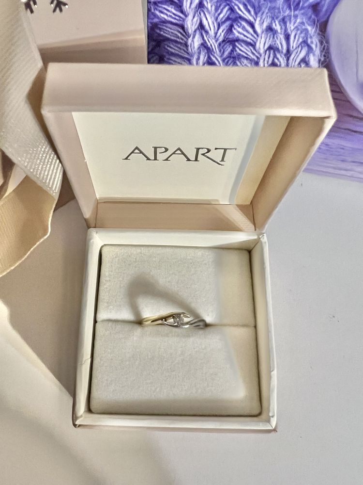 Pierścionek Apart diament 0,07 ct. białe i żółte złoto 585 rozm. 11.